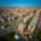 Aerial Perspective of Emaar South Aerial view of Emaar South showcasing residential buildings and green spaces