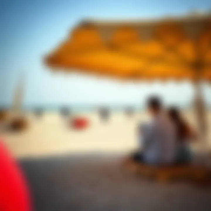 Visitors enjoying recreational activities at Alraha Beach